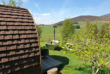 Camping pod with optional wood-fired hot tub