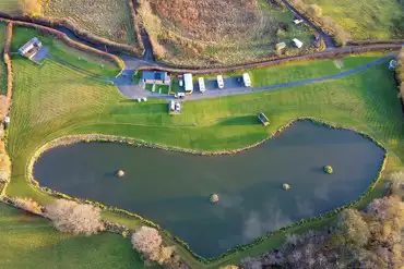 Aerial of Spring Rock Holidays with a large fishing lake
