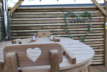 Heated camping pods with hot tub (wood view)