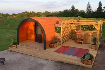 Heated camping pods with hot tub (wood view)