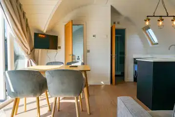 Side entry pod dining area and TV
