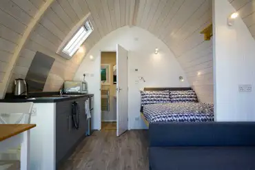 Elite pod well-equipped kitchenette and dining space