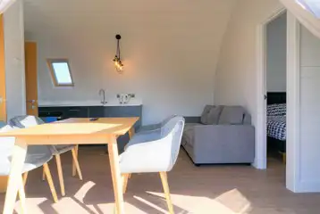 Side entry pod kitchen and a double sofa bed