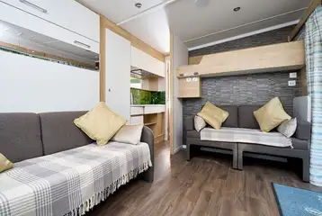 Glamping pod sofa and bunk bed level