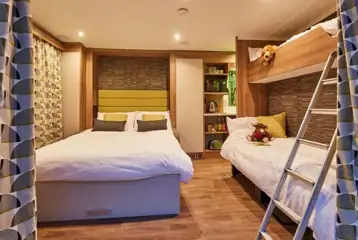 Ensuite glamping pod with a fold-down bed and sofa/bunk bed