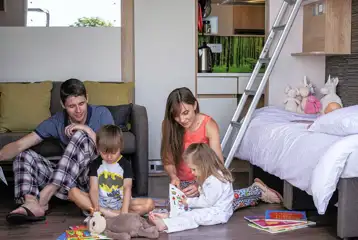 Family friendly glamping pod with a ladder to the bunk bed