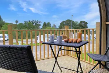 Accessible ensuite glamping pod outdoor seating area