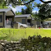 Ensuite glamping cabins with covered outdoor deck areas Ensuite glamping cabins with covered outdoor deck areas