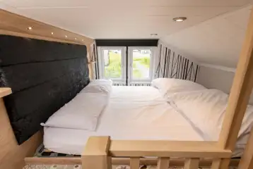 Glamping cabin mezzanine level with twin beds