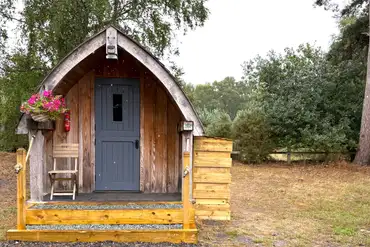 Dog friendly wooden camping pods