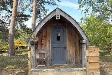 Dog friendly wooden camping pods