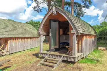 Oak Pod with electric, lighting, heating, two fold out camp beds and double bed