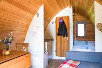 Ensuite glamping pod interior with furnishings