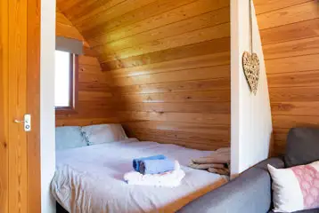 Ensuite glamping pod double bed (linen packs available for a cost) 