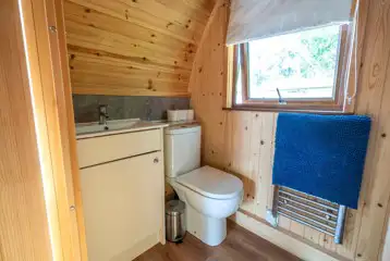 Alpaca pod ensuite with a toilet, hand basin and shower (bring towels)