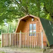 Cocoon camping pod with a small decking area