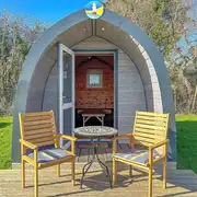 Camping pod (four person) with small decking and outdoor seating Camping pod (four person) with small decking and outdoor seating