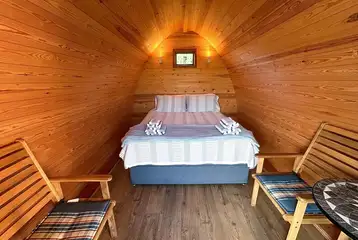 Camping pod king size bed frame and mattress (bring your own bedding and towels) Camping pod king size bed frame and mattress (bring your own bedding and towels)