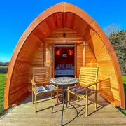 Camping pod (two person) with small decking and outdoor seating Camping pod (two person) with small decking and outdoor seating