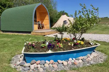 Camping pods with parking space for one vehicle