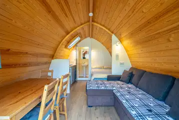 Bambi ensuite glamping pod sofa bed and dining area Bambi ensuite glamping pod sofa bed and dining area