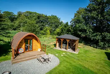 Bunny glamping pod with outdoor seating and a sheltered hot tub Bunny glamping pod with outdoor seating and a sheltered hot tub