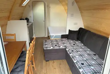 Ensuite glamping pod - interior with a double bed and sofa bed Ensuite glamping pod - interior with a double bed and sofa bed