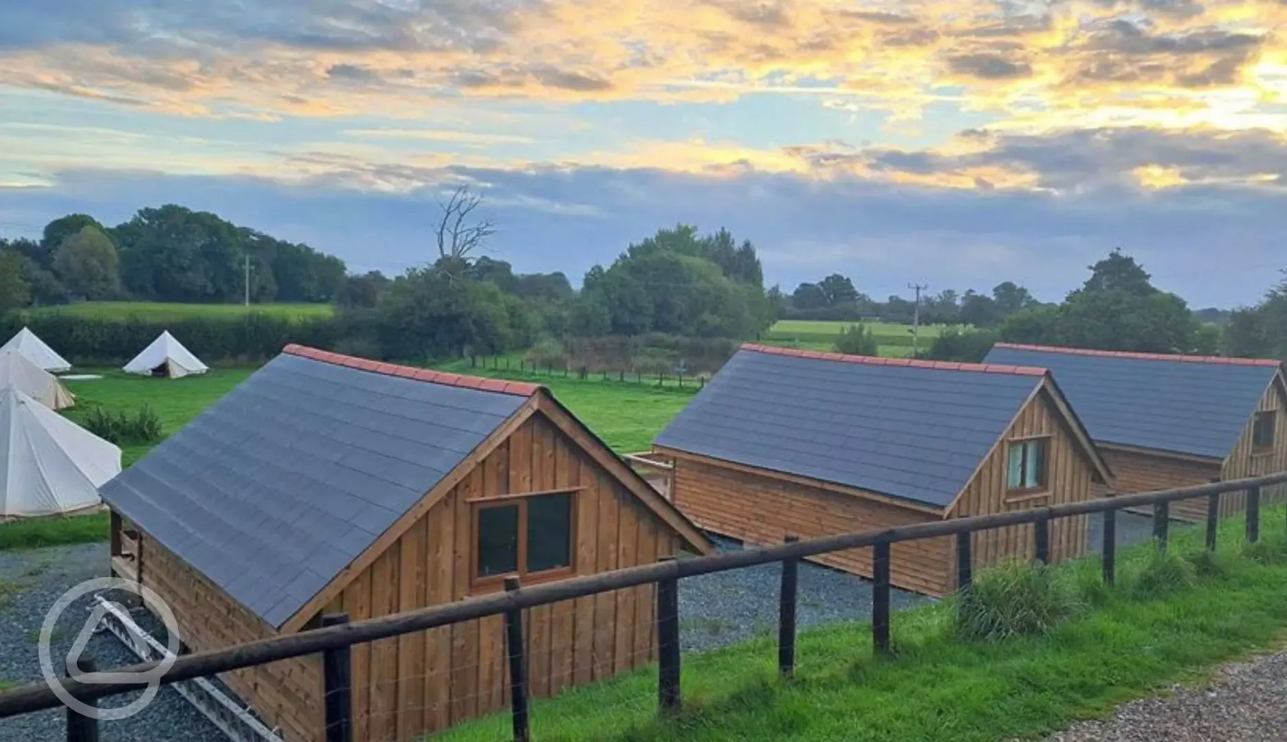 Glamping lodges at dusk