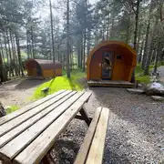 Picnic bench outside a camping pod