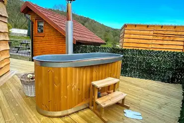 Mini lodge pod with hot tub