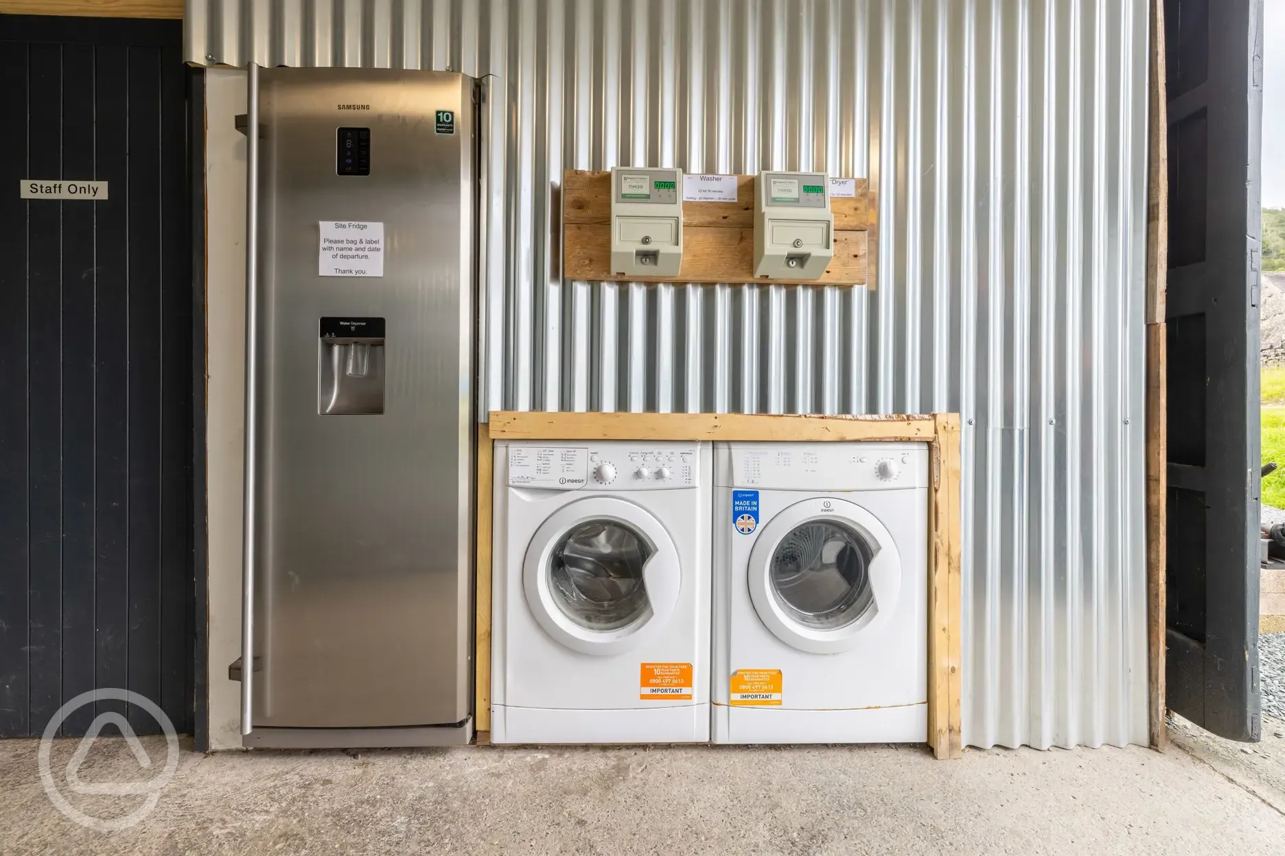 Laundry area, with a £2 charge per 15 minutes to use the machines