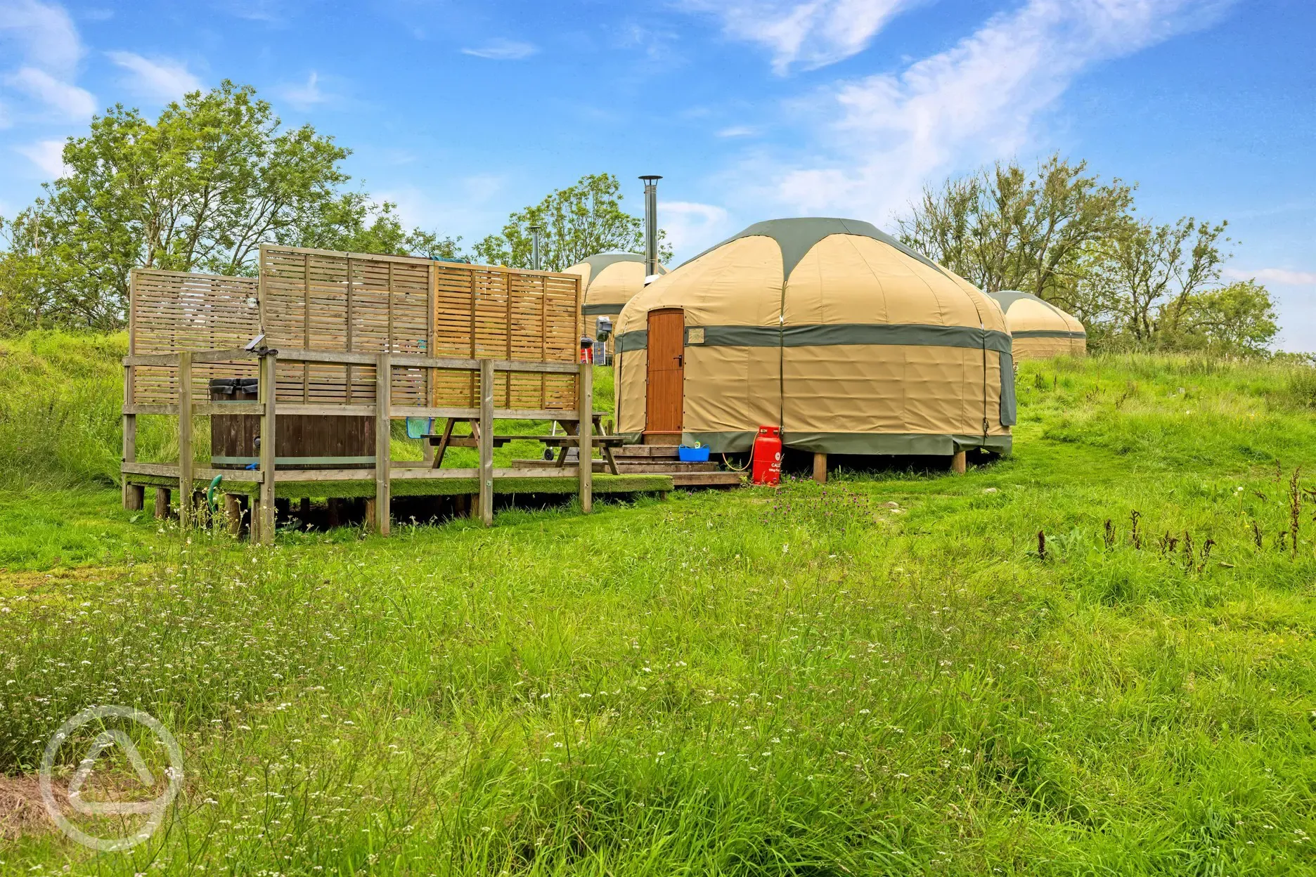 Yurts with hot tub, sleeping six with a double bed and four single futons
