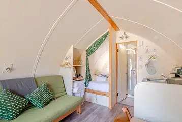 Bare Bones with a king bed, double sofa and drop-down single bunk