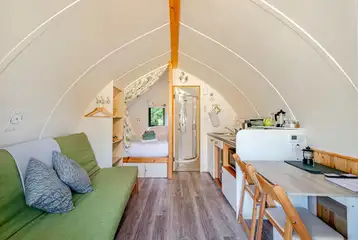 The Rushy Lot pod with a king size bed, sofa bed, kitchen and ensuite
