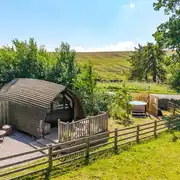 The Rushy Lot with a fire pit area and tucked away optional hot tub