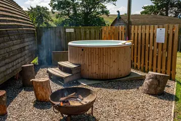 The Wheatley's private fire pit and optional wood-fired hot tub