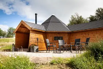 Each glamping cabin has a private outdoor seating area Each glamping cabin has a private outdoor seating area