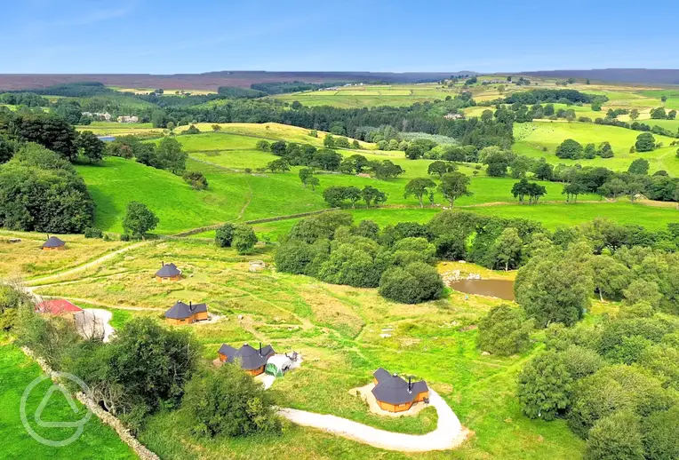 Aerial of Little Seed Field amongst woodland, ponds and countryside