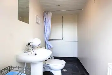 Onsite shared washroom facilities for standard glamping cabins Onsite shared washroom facilities for standard glamping cabins