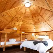 Cabin at Little Seed Field with a double bed and bunk bed (bedding provided)