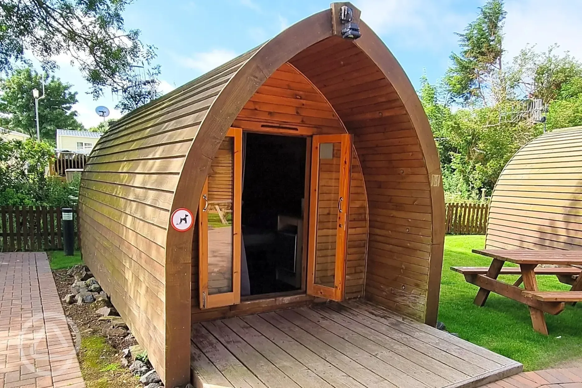 Dog friendly camping pod (marked by a sign)