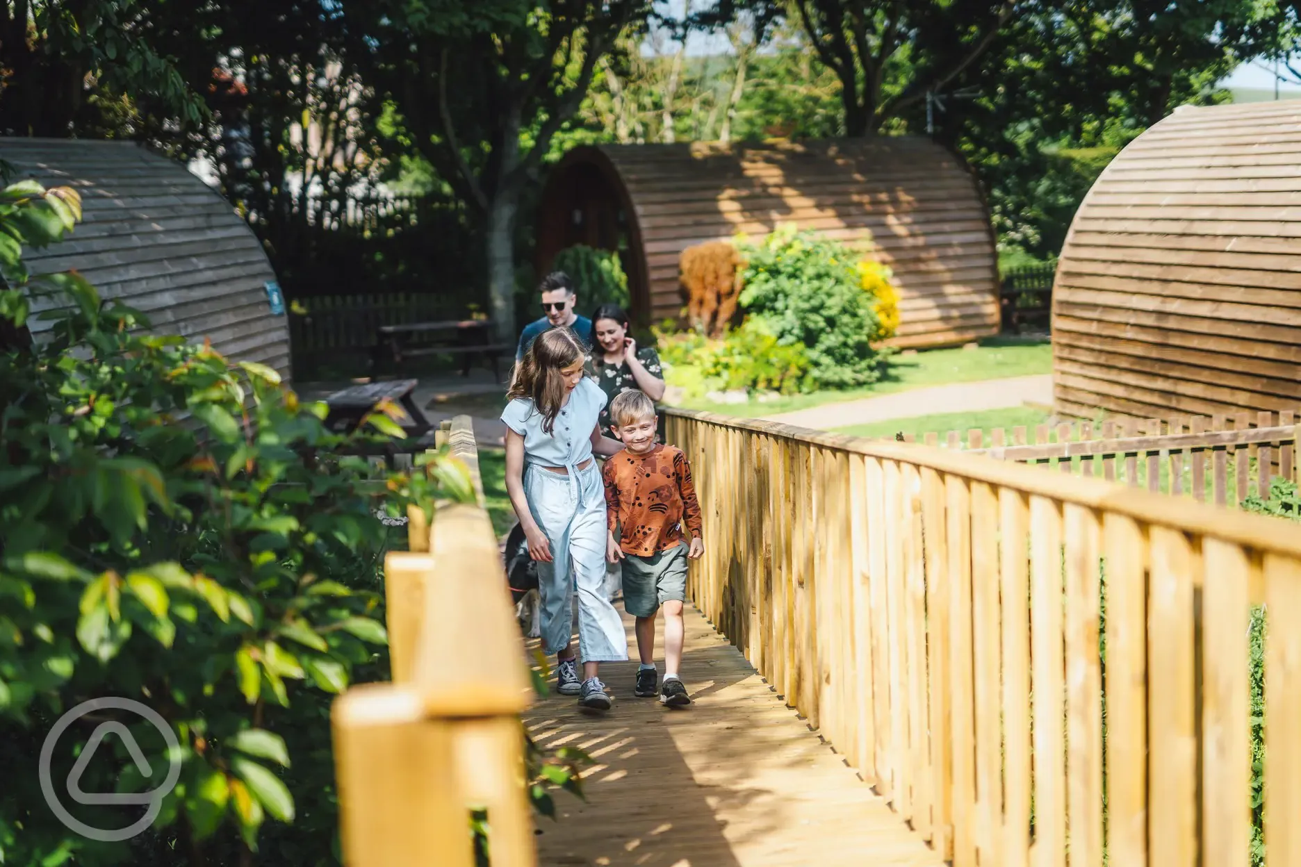 Camping pod village with a walkway