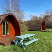 Camping pods with picnic tables and fire pits Camping pods with picnic tables and fire pits