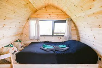 Pod interior with a double bed (bedding and towels included)