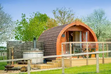 Ensuite glamping pod, each with a private hot tub Ensuite glamping pod, each with a private hot tub