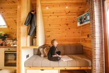 Ensuite glamping pod interior with a Smart TV Ensuite glamping pod interior with a Smart TV