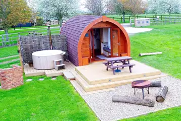 Glamping pod with hot tub