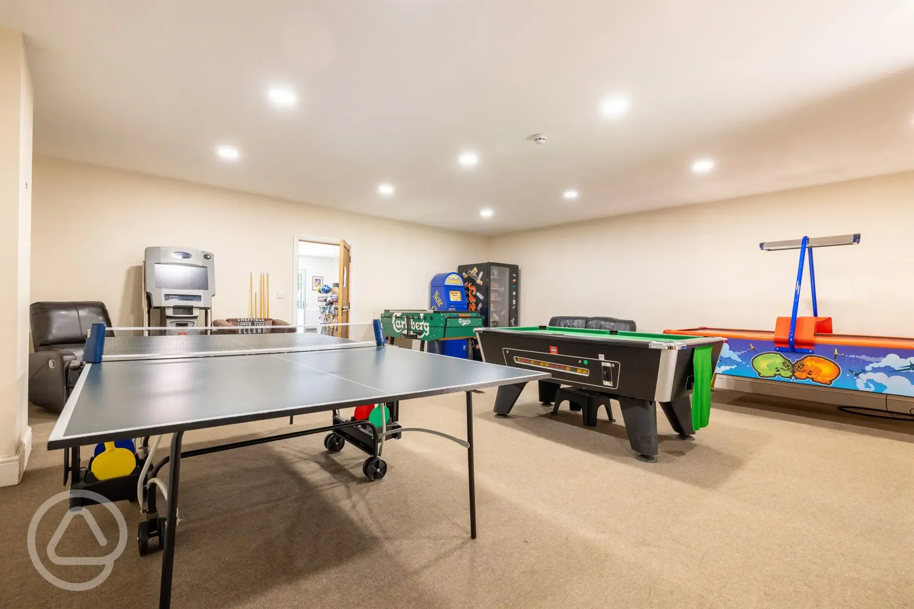 Games room with ping pong, pool, and air hockey at Nurseries Caravan Park