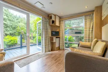 Studio pod cabin living area with a TV and DVD player Studio pod cabin living area with a TV and DVD player