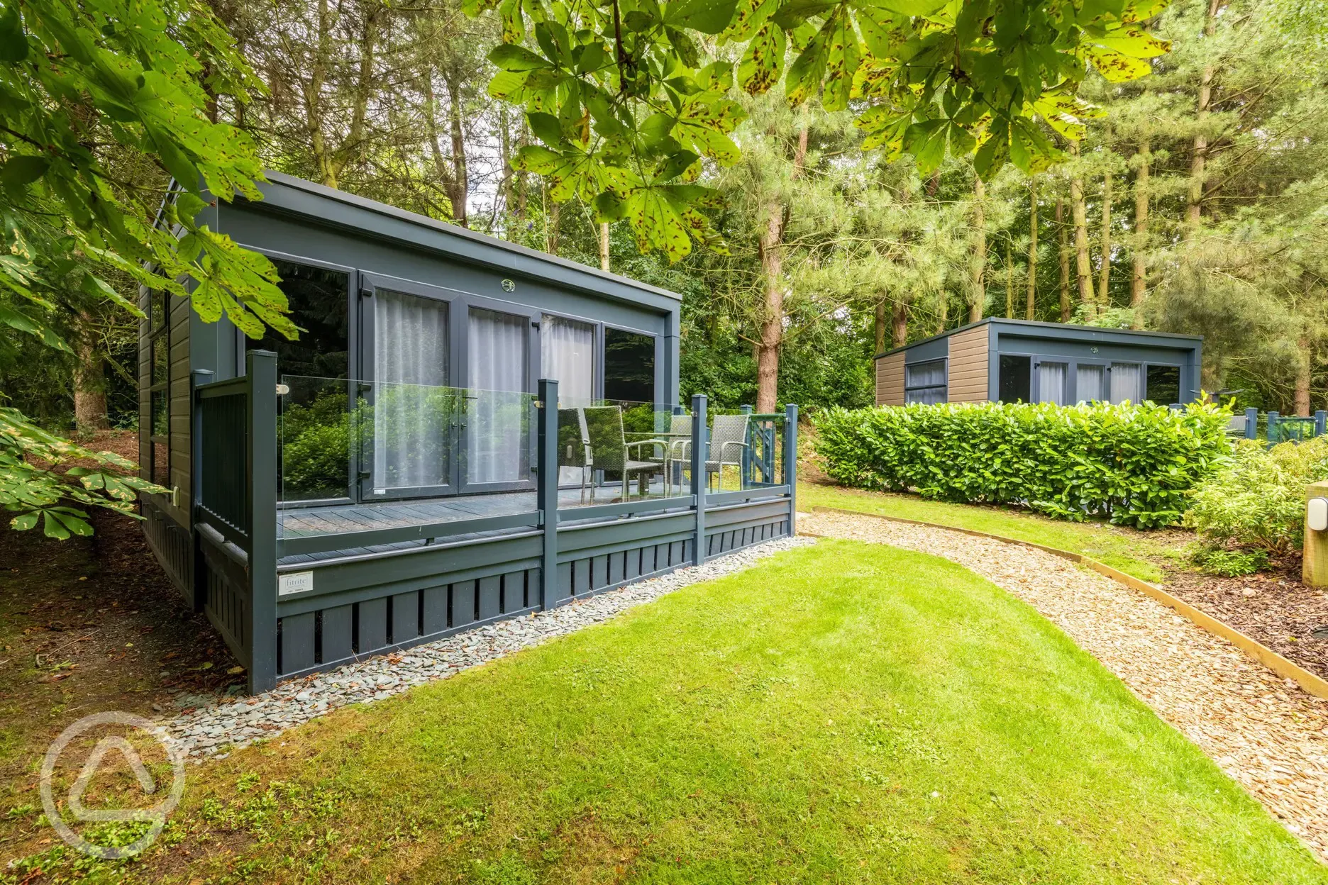 Studio pod ensuite cabin with private decking and outdoor seating 